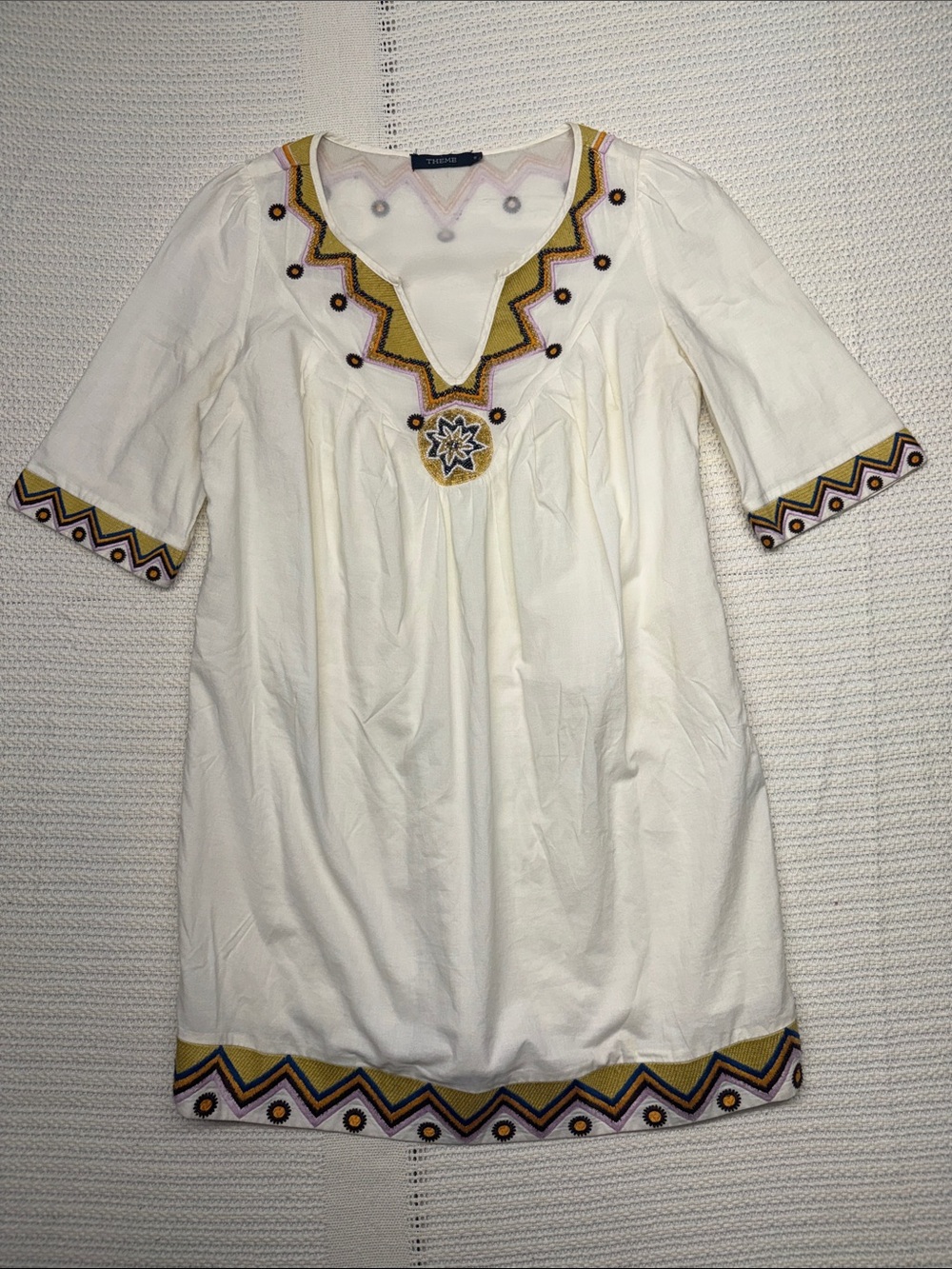 Theme Cream Tunic with Subtle Yellow, Purple & Black Embroidery Accents